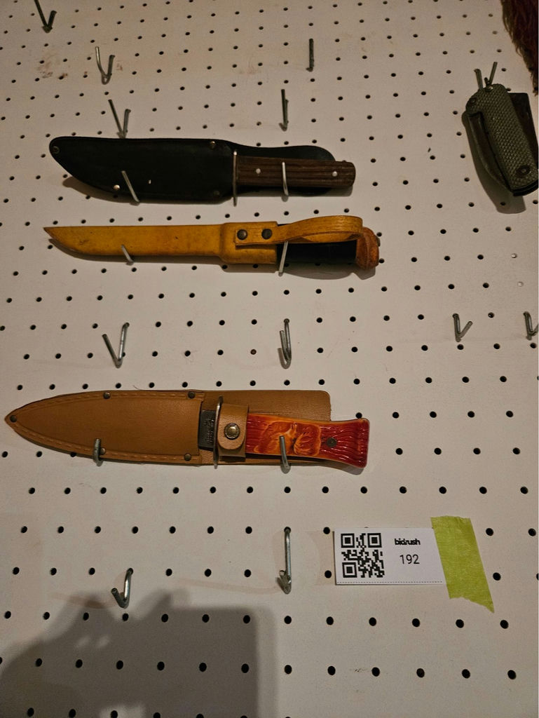 Assorted fixed-blade knives with leather sheaths - image 1 of 4