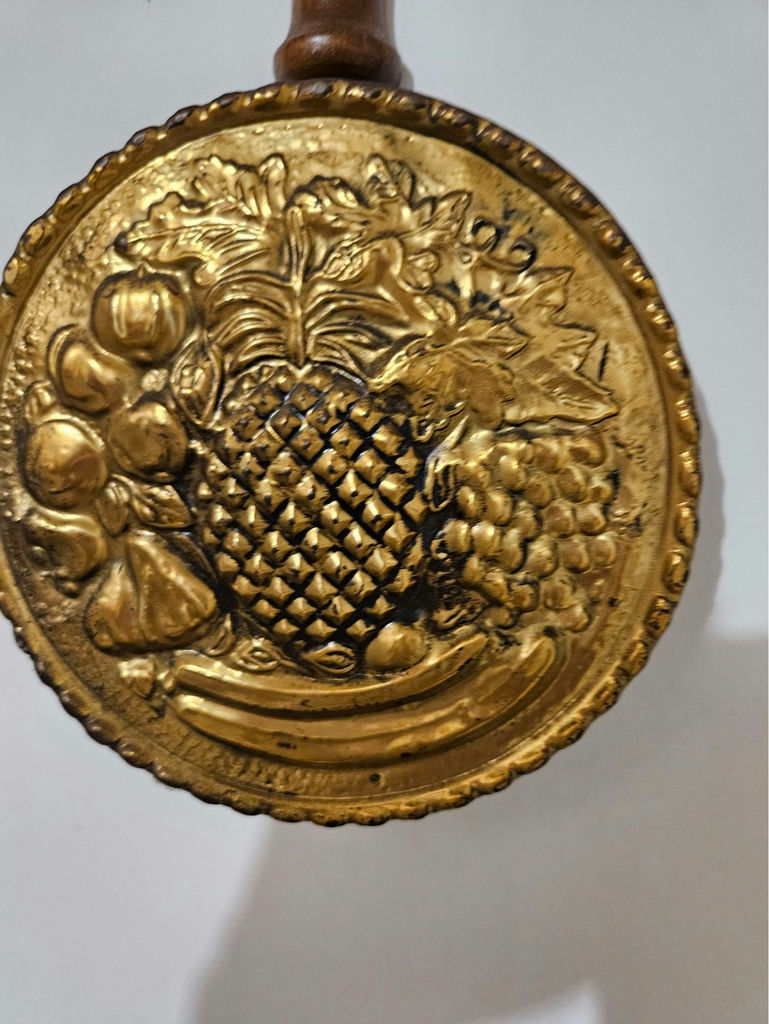 Pair of brass fruit-embossed medallions on wooden handles - image 2 of 5