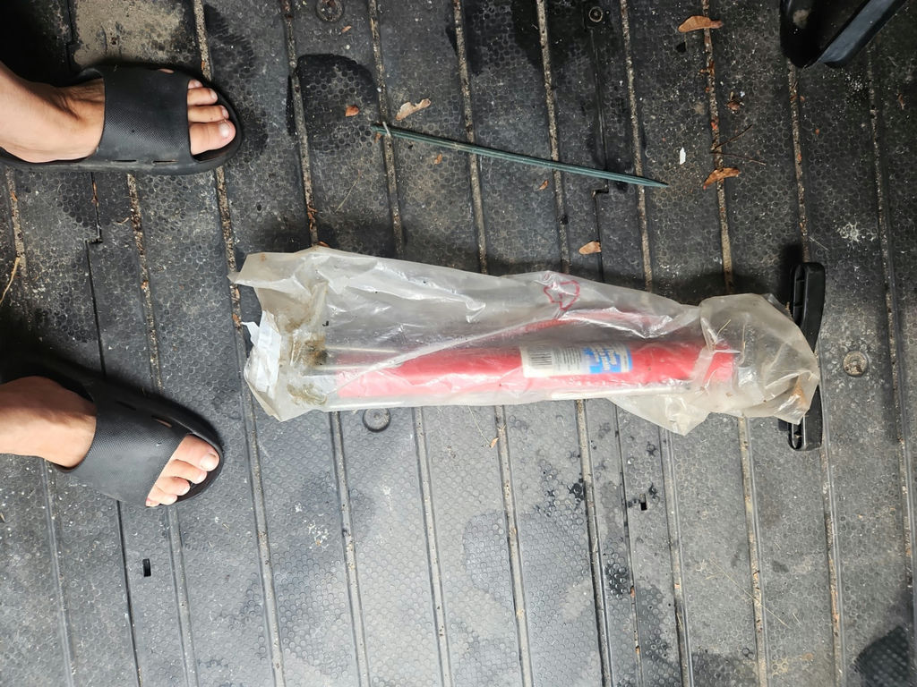 Red handheld manual air pump with hose - image 4 of 8
