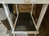 Assorted furniture pieces: white glass-top display tables, a console table, and a wooden dresser - thumbnail 3 of 16