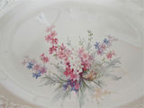Pair of oval floral ceramic plates/platters with embossed border - thumbnail 5 of 9