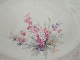 Pair of oval floral ceramic plates/platters with embossed border - thumbnail 4 of 9