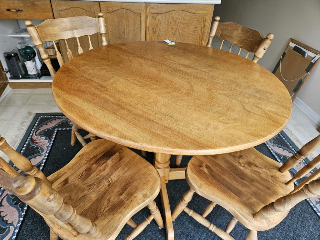 40" Round wooden dining table with four spindle-back chairs - image 5 of 7