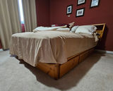 Wooden platform bed with built-in storage and headboard shelves - thumbnail 1 of 11