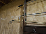 Dark wooden rack with rod display and golf ball bucket - thumbnail 3 of 8