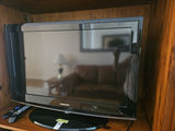 31" Samsung TV with Roku streaming device and remotes - thumbnail 2 of 7