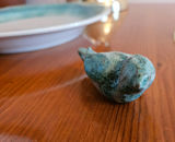 Blue-green glazed ceramic plate with small bird sculpture - thumbnail 7 of 8