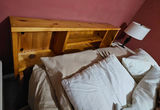 Wooden platform bed with built-in storage and headboard shelves - thumbnail 6 of 11