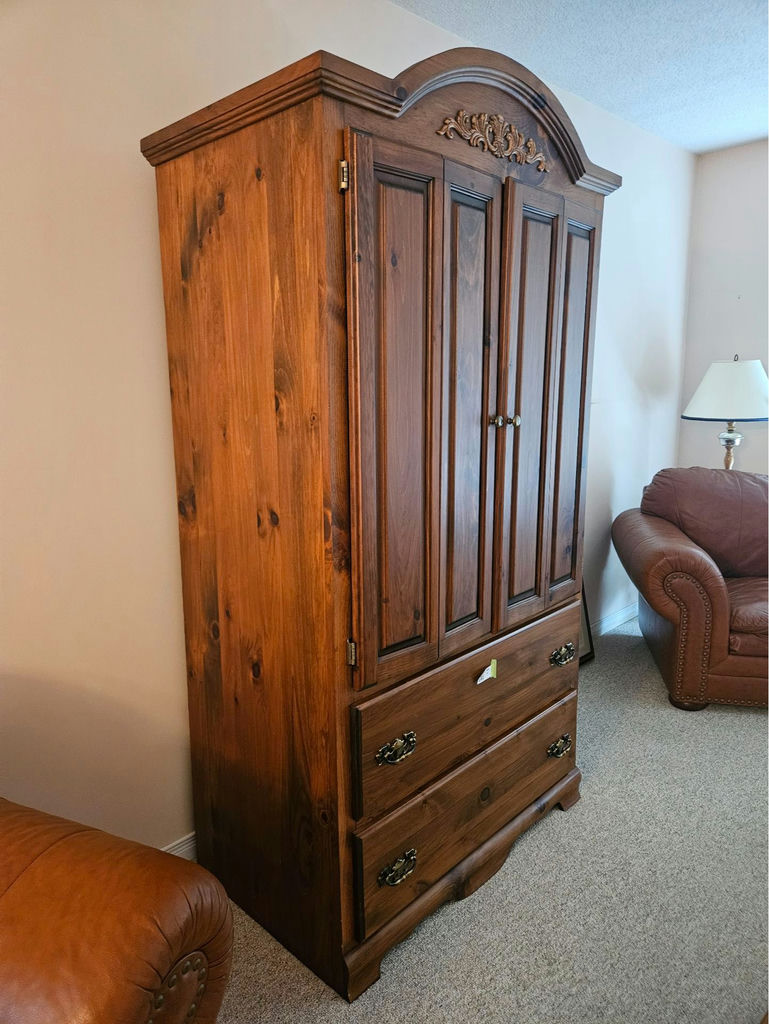 Large wooden armoire with carved crest and drawers - image 2 of 16