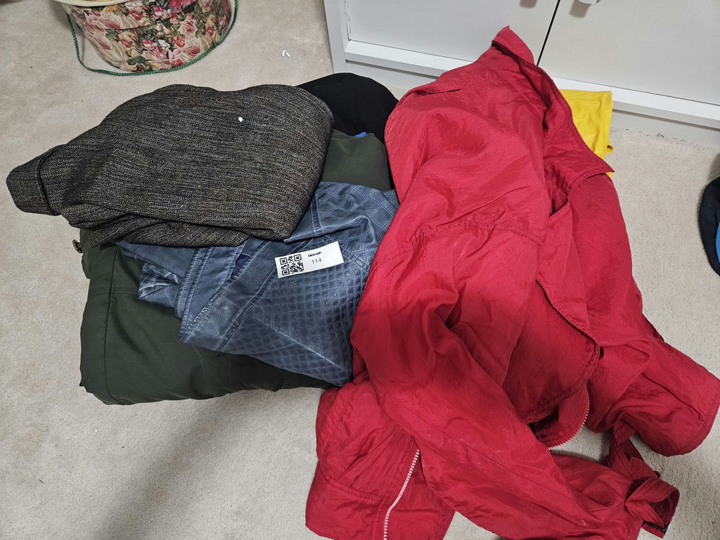 Pile of assorted jackets and coats - image 1 of 8