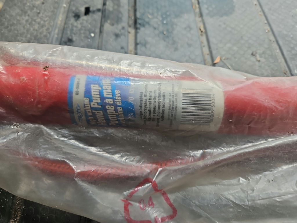 Red handheld manual air pump with hose - image 2 of 8