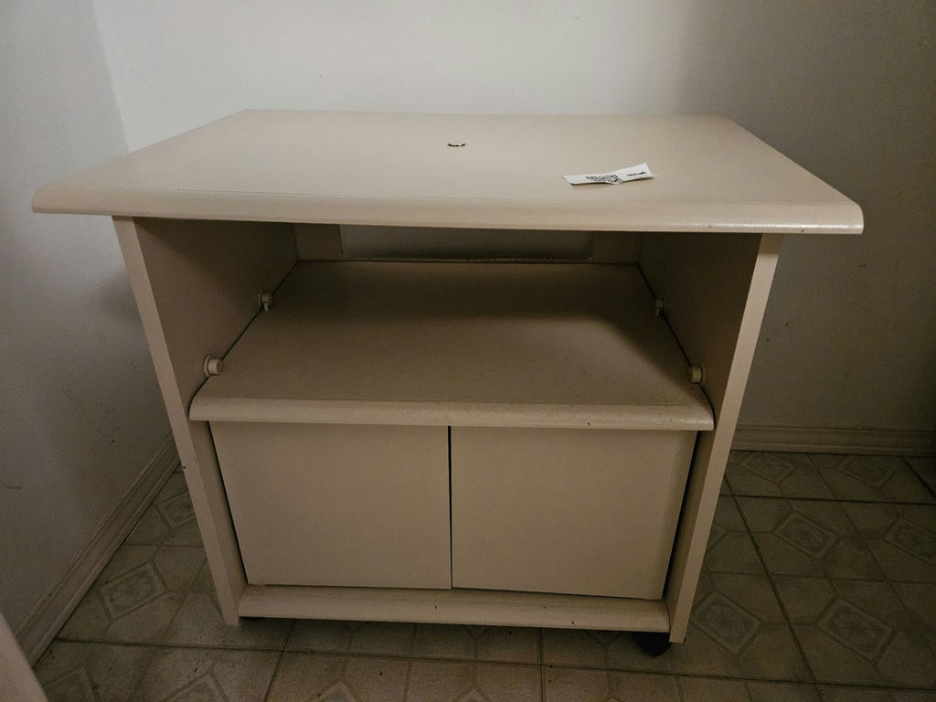 Beige freestanding cabinet with open shelf and double doors - image 2 of 6