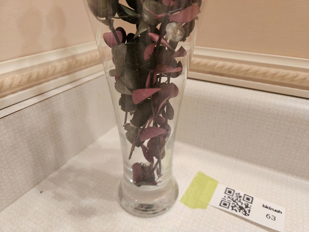 Glass vase with artificial eucalyptus stems - image 2 of 3