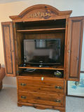 Large wooden armoire with carved crest and drawers - thumbnail 14 of 16