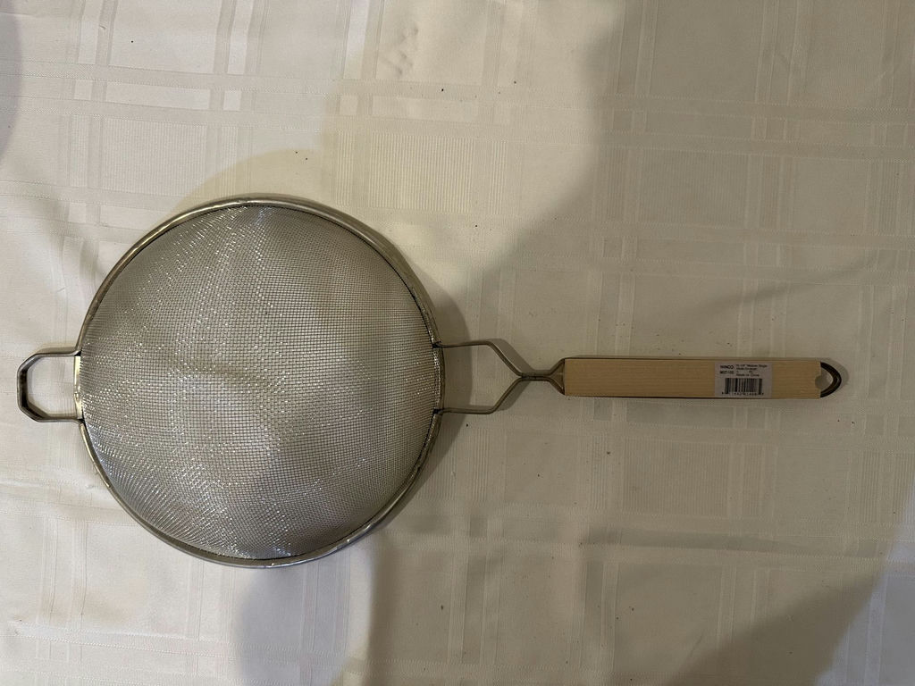Stainless steel nesting bowls and a metal mesh strainer - image 3 of 5