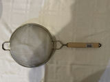 Stainless steel nesting bowls and a metal mesh strainer - thumbnail 3 of 5