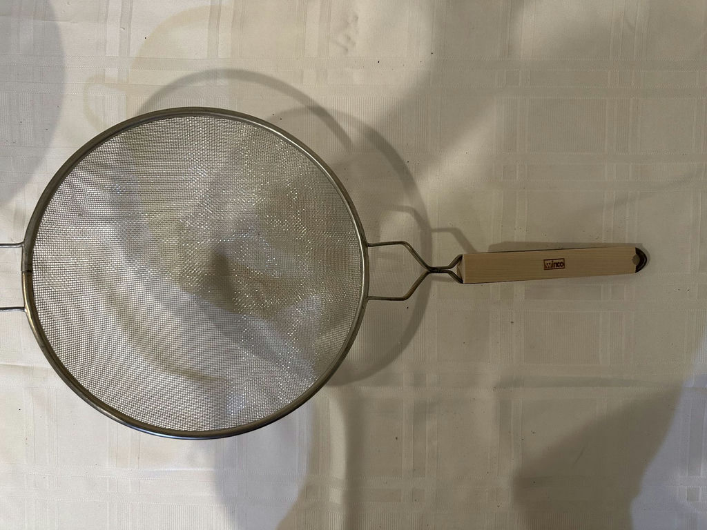 Stainless steel nesting bowls and a metal mesh strainer - image 2 of 5
