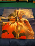 E.T. The Extra-Terrestrial memorabilia: VHS box, poster, and artwork - thumbnail 5 of 7