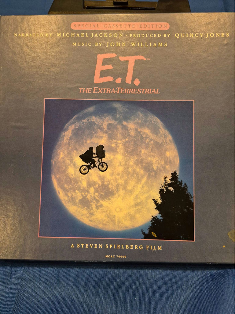 E.T. The Extra-Terrestrial memorabilia: VHS box, poster, and artwork - image 1 of 7
