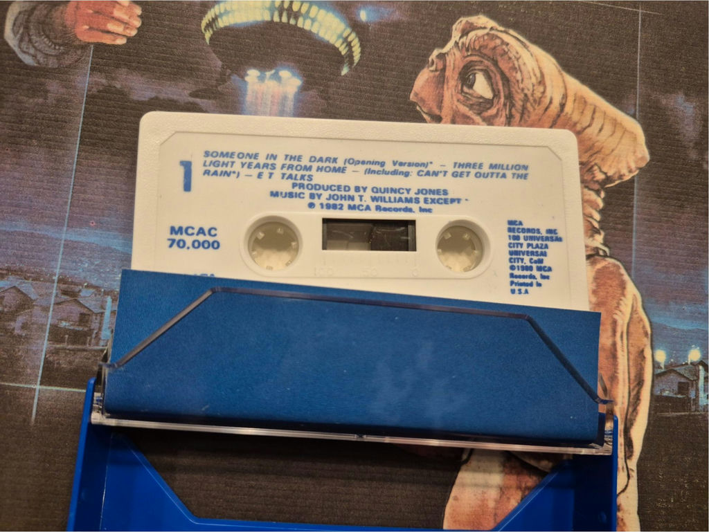 E.T. The Extra-Terrestrial memorabilia: VHS box, poster, and artwork - image 4 of 7