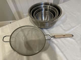 Stainless steel nesting bowls and a metal mesh strainer - thumbnail 1 of 5