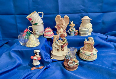 Assorted ceramic figurines and decorative toppers - Image 1 of 2