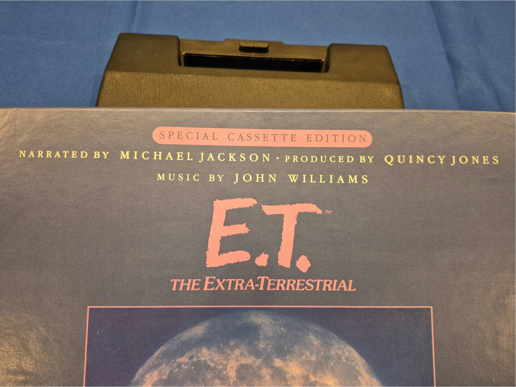 E.T. The Extra-Terrestrial memorabilia: VHS box, poster, and artwork - image 2 of 7