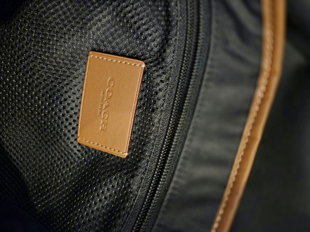 Coach black pebbled leather backpack with flower charms - image 5 of 5