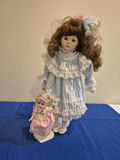 Two Porcelain Doll And Small Plastic Doll in Lace Dresses - thumbnail 1 of 3