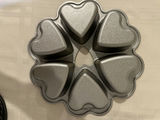 Assorted baking pans and molds (flower, heart, and round mini-bundt shapes) - thumbnail 3 of 5