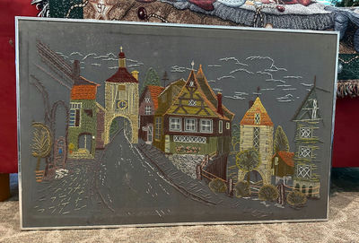 Needlepoint village street scene framed artwork - Image 1 of 2