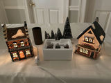 Heritage Village Christmas Scene: Lit Houses, Snowy Trees, and Carolers - thumbnail 1 of 6