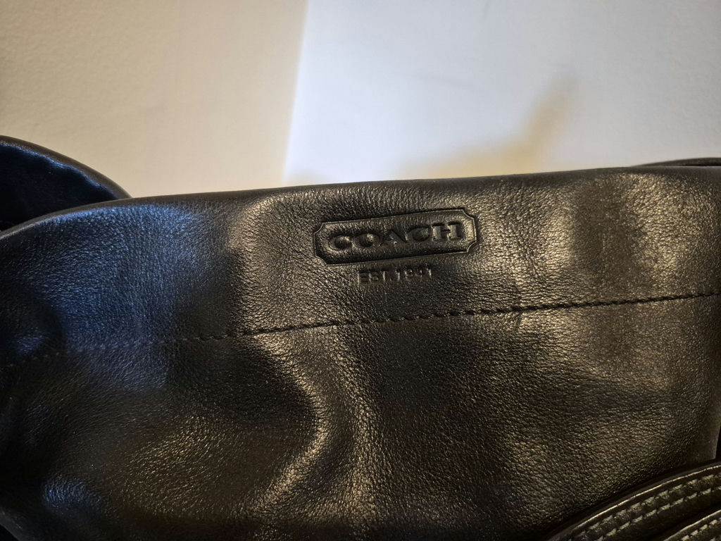 Coach black leather handbag with brass hardware - image 2 of 3