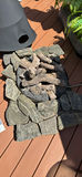 Chiminea-style outdoor fire pit with stone surround - thumbnail 2 of 4