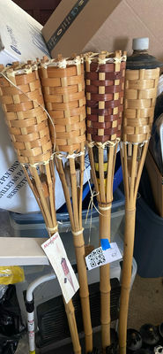 Bamboo tiki torches and citronella lamp oil - Image 1 of 4