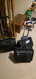 Assorted black rolling luggage bags - thumbnail 4 of 7