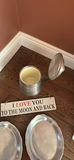 Two oval pewter trays, a lidded pewter pitcher, and a decorative sign - thumbnail 6 of 6