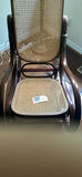 Wooden rocking chair with caned back and seat - thumbnail 1 of 3