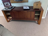 Wooden mid-century sideboard with glass display panel and open shelves - thumbnail 3 of 3