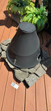 Chiminea-style outdoor fire pit with stone surround - thumbnail 1 of 4