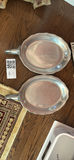 Two oval pewter trays, a lidded pewter pitcher, and a decorative sign - thumbnail 1 of 6