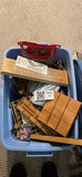 Assorted board games and game pieces in a blue tote - thumbnail 1 of 4