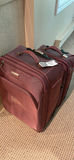 Two maroon rolling suitcases - thumbnail 2 of 4