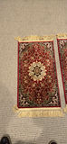 Pair of red Persian-style patterned rugs - thumbnail 2 of 2