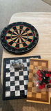 Assorted board games and game pieces in a blue tote - thumbnail 3 of 4