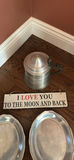 Two oval pewter trays, a lidded pewter pitcher, and a decorative sign - thumbnail 5 of 6