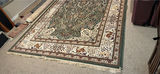 Green-centered oriental area rug with floral border - thumbnail 2 of 4