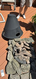 Chiminea-style outdoor fire pit with stone surround - thumbnail 3 of 4