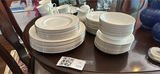 White bone china dinnerware set with dishes, cups, and teapot - thumbnail 2 of 6