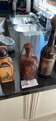 Decorative decanter set with embossed leatherette bottles - Image 1 of 4